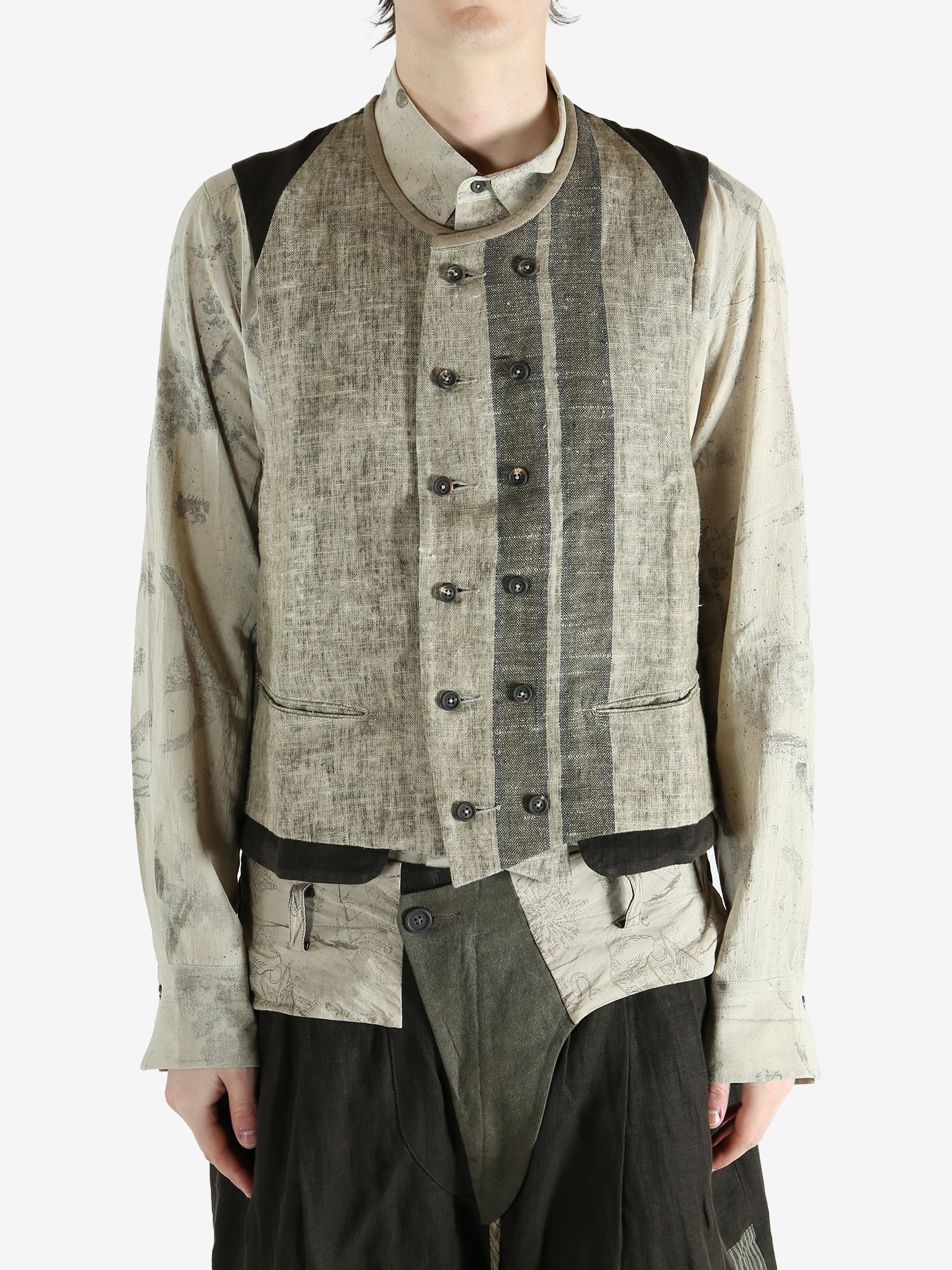 Green gilet worn by a person, showing the gilet's fit