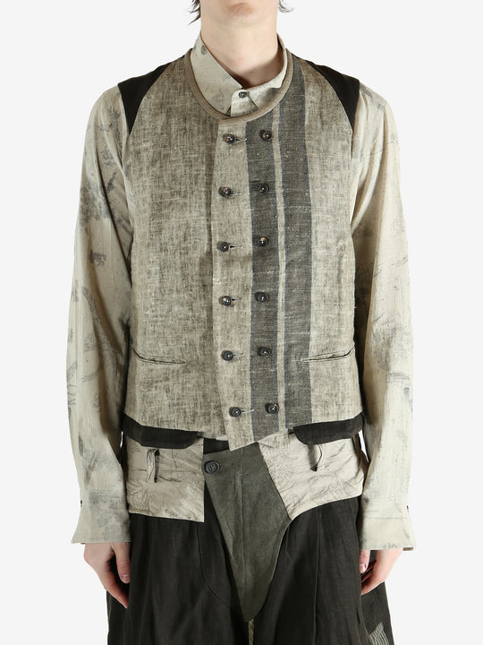 Green gilet worn by a person, showing the gilet's fit