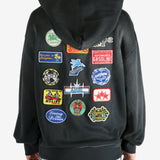 Black hoodie worn by a person, showing the hoodie’s fit