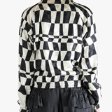 Black jacket worn by a person, showing the jacket's fit