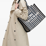 Blue bag worn by a person, showing the bag's fit