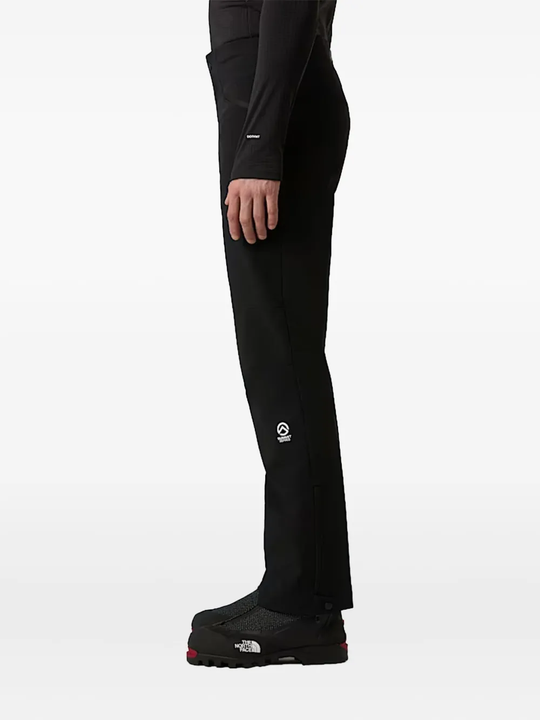 Black pant worn by a person, showing the pant fit