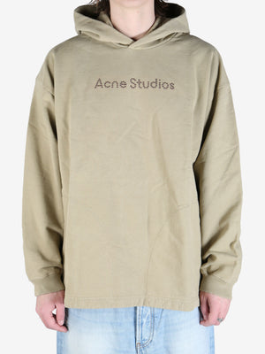 Sand beige hoodies worn by aperson, showing the hoodies's fit