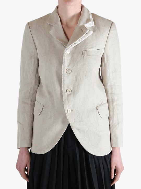 White jacket worn by a person, showing the white jacket fit