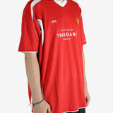 Red t-shirt worn by a person, showing the shirt's fit