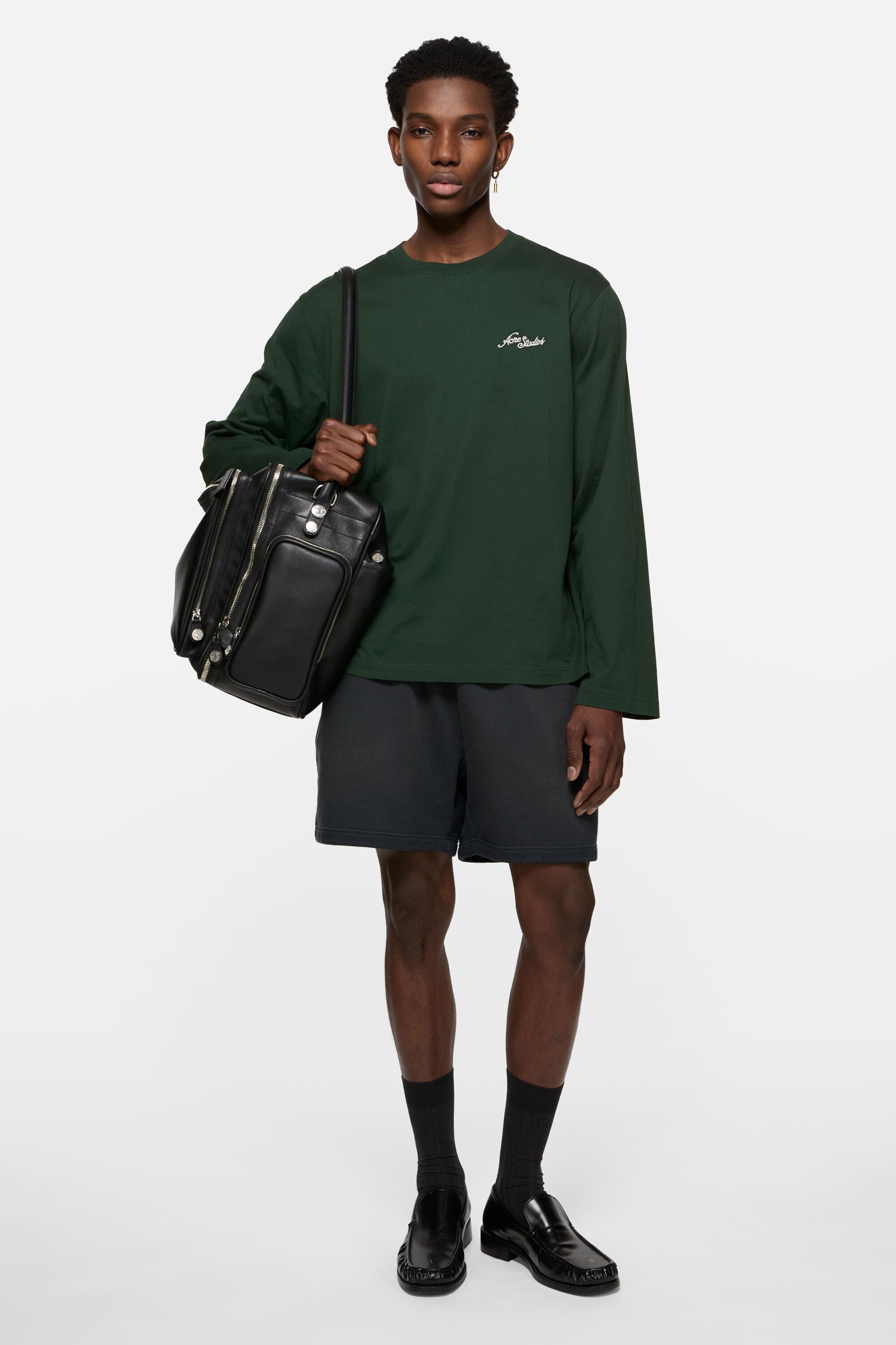 Green t-shirt, full body view