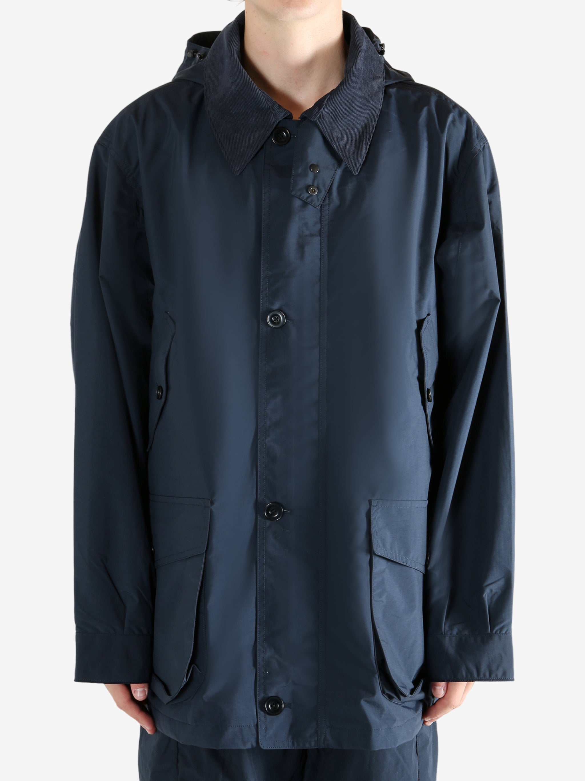 Navy jacket worn by a person, showing the jacket's fit