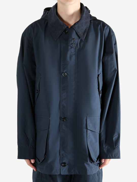 Navy jacket worn by a person, showing the jacket's fit