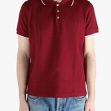 Red shirt worn by a person, showing the fit