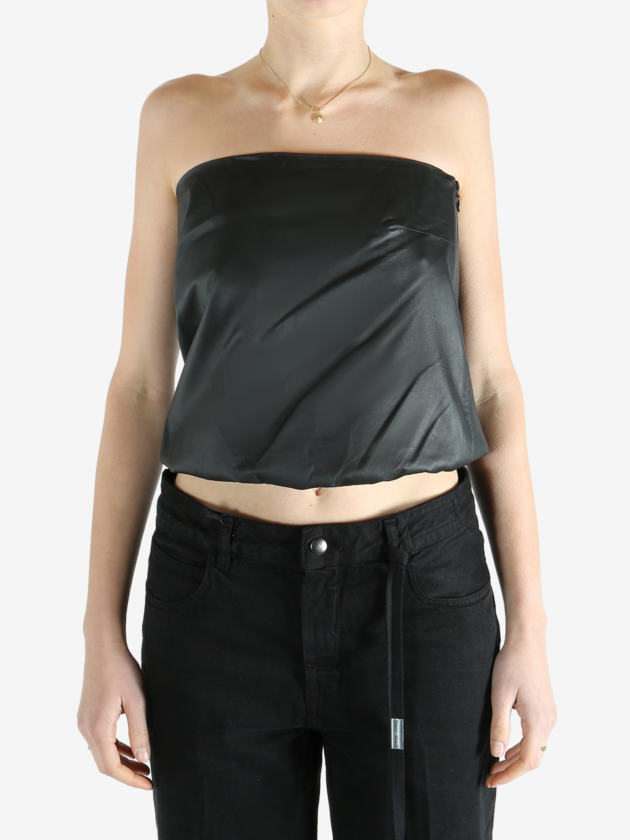 black top worn by a person, showing the top fit