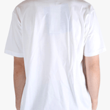 White t-shirt worn by a person, showing the t-shirt's fit