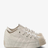 White sneaker, front view