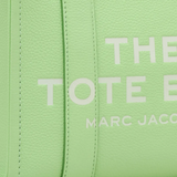 Close up of green bags,showing texture of the leather fabric.