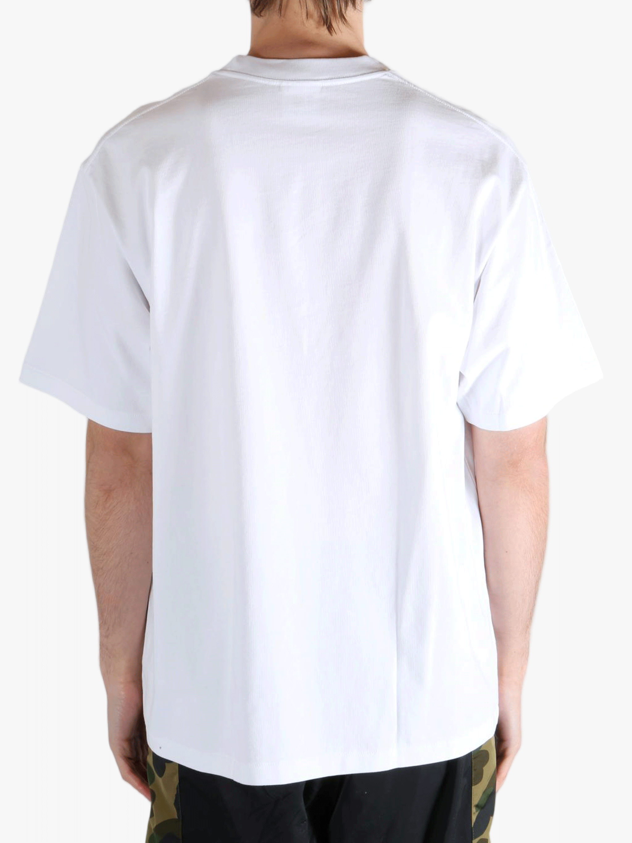 White T-shirt worn by a person, showing the t-shirt's fit
