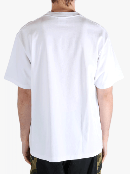 White T-shirt worn by a person, showing the t-shirt's fit