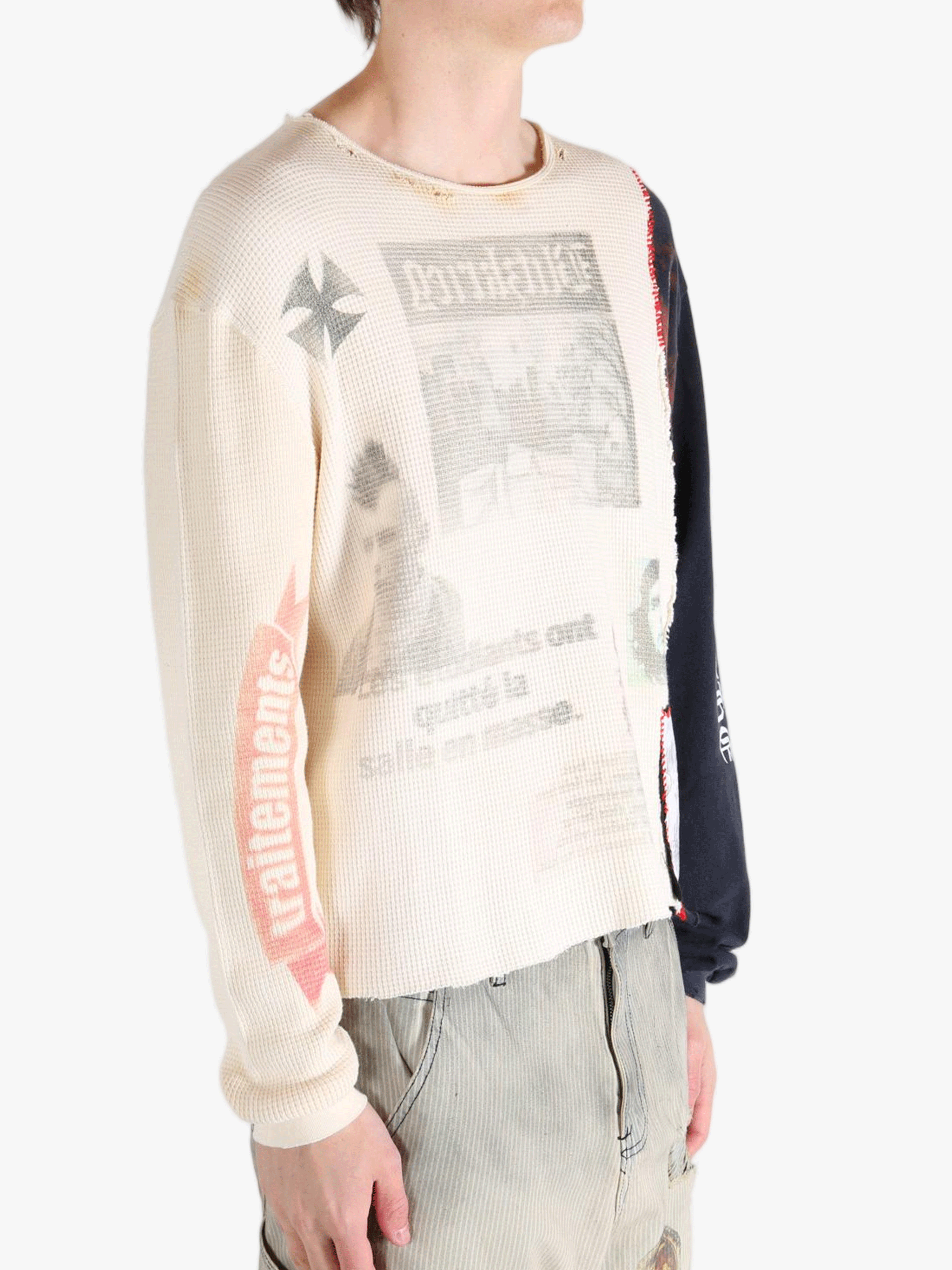 White knitwear worn by a person, showing the knitwear fit