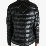 Black jacket worn by a person, showing the jacket's fit