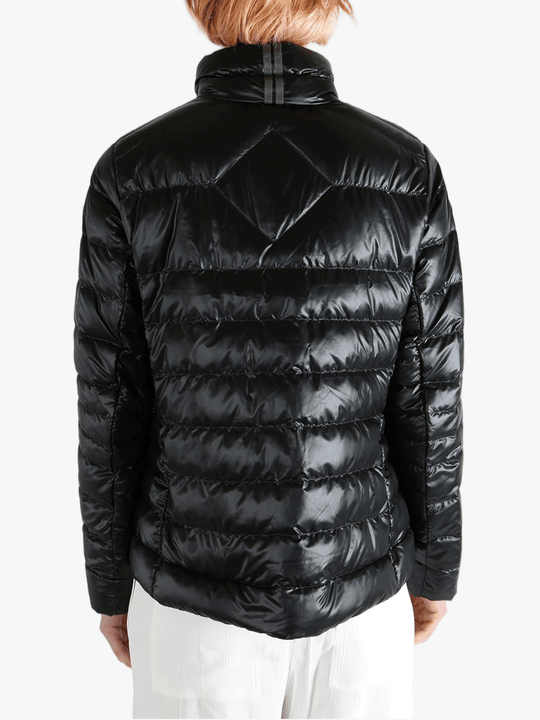 Black jacket worn by a person, showing the jacket's fit