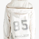 White sweats worn by a person, showing the sweats fit