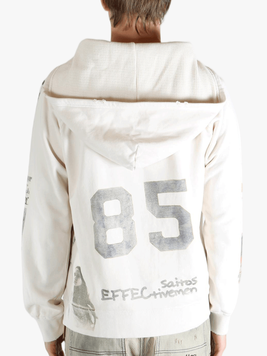 White sweats worn by a person, showing the sweats fit