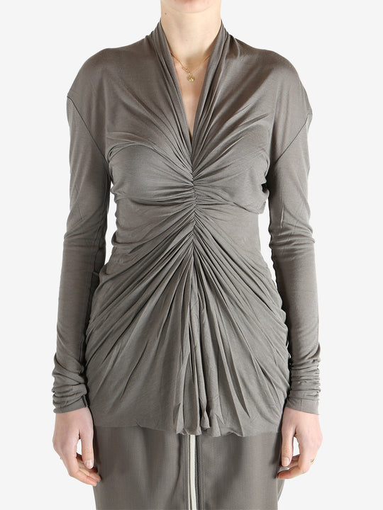 Grey t-shirt worn by a person, showing the t-shirt's fit