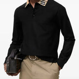 Black top worn by a person, showing the top fit