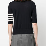 Navy T-shirt worn by a person, showing the shirt’s fit