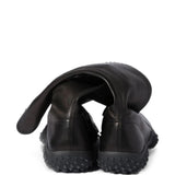 Black boots, back view