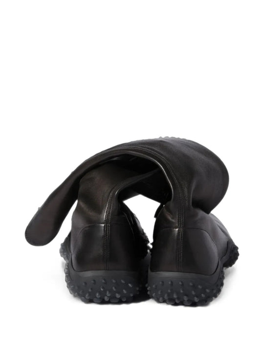 Black boots, back view