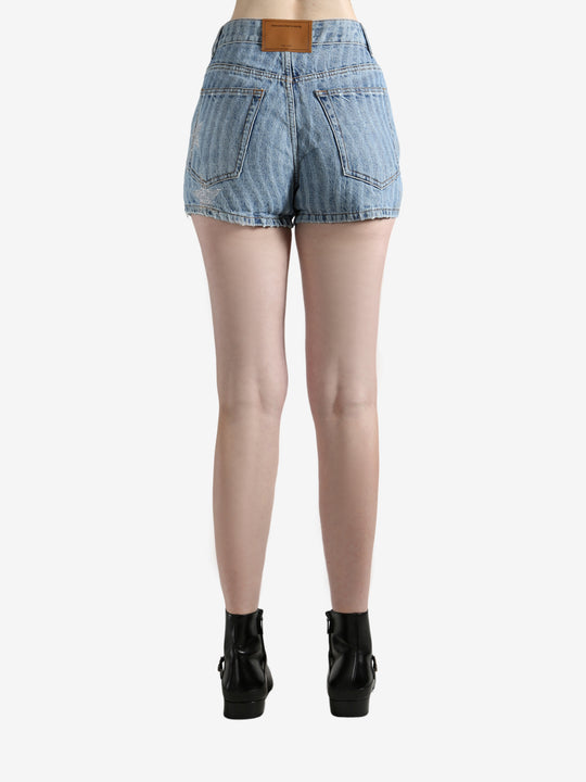 Blue shorts worn by a person, showing the shorts' fit