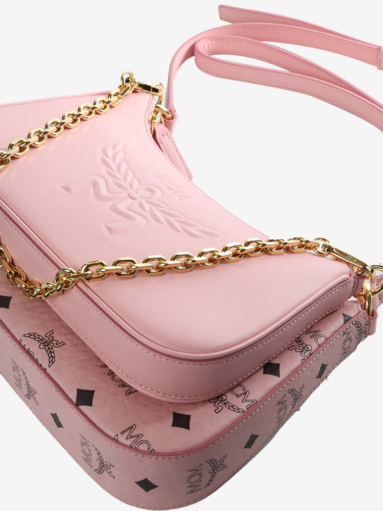 Close up of pink bag, showing texture of the fabric