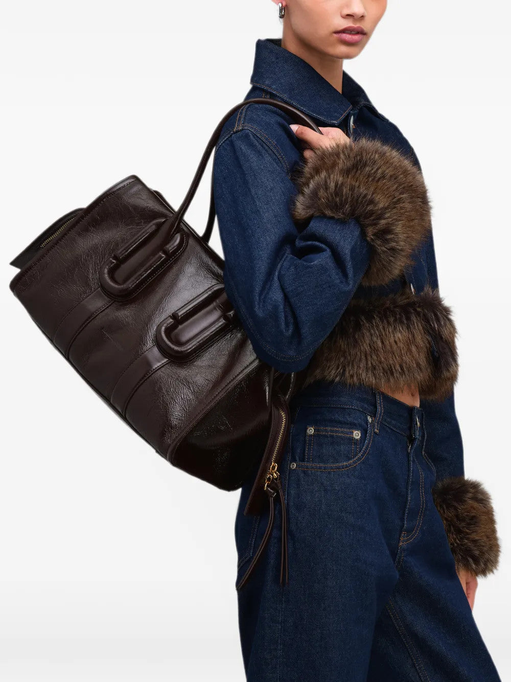 Brown bag worn by a person, showing the bag fit