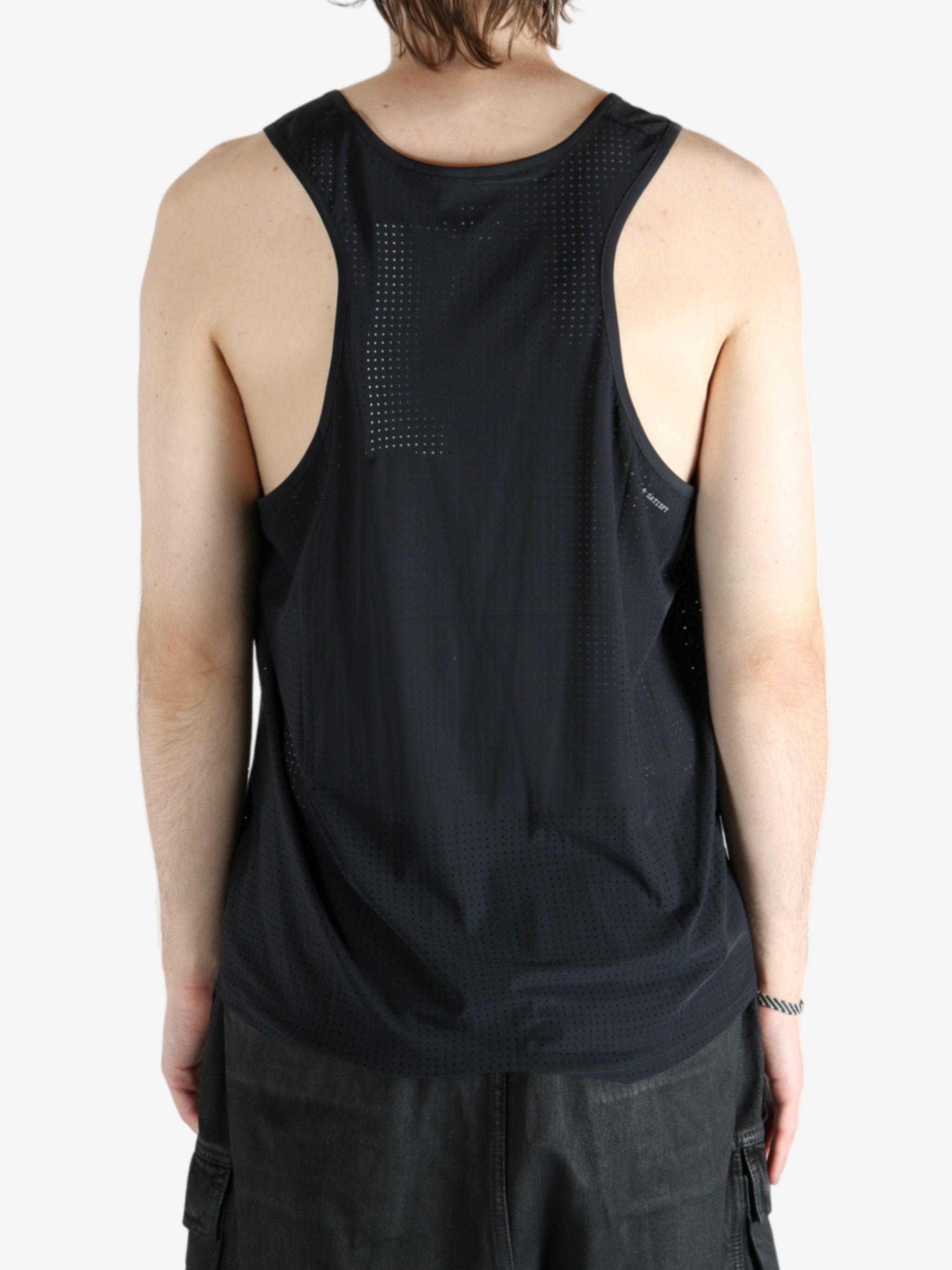 Black activewear worn by a person, showing the activewear's fit