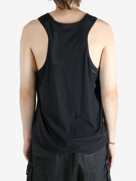 Black activewear worn by a person, showing the activewear's fit