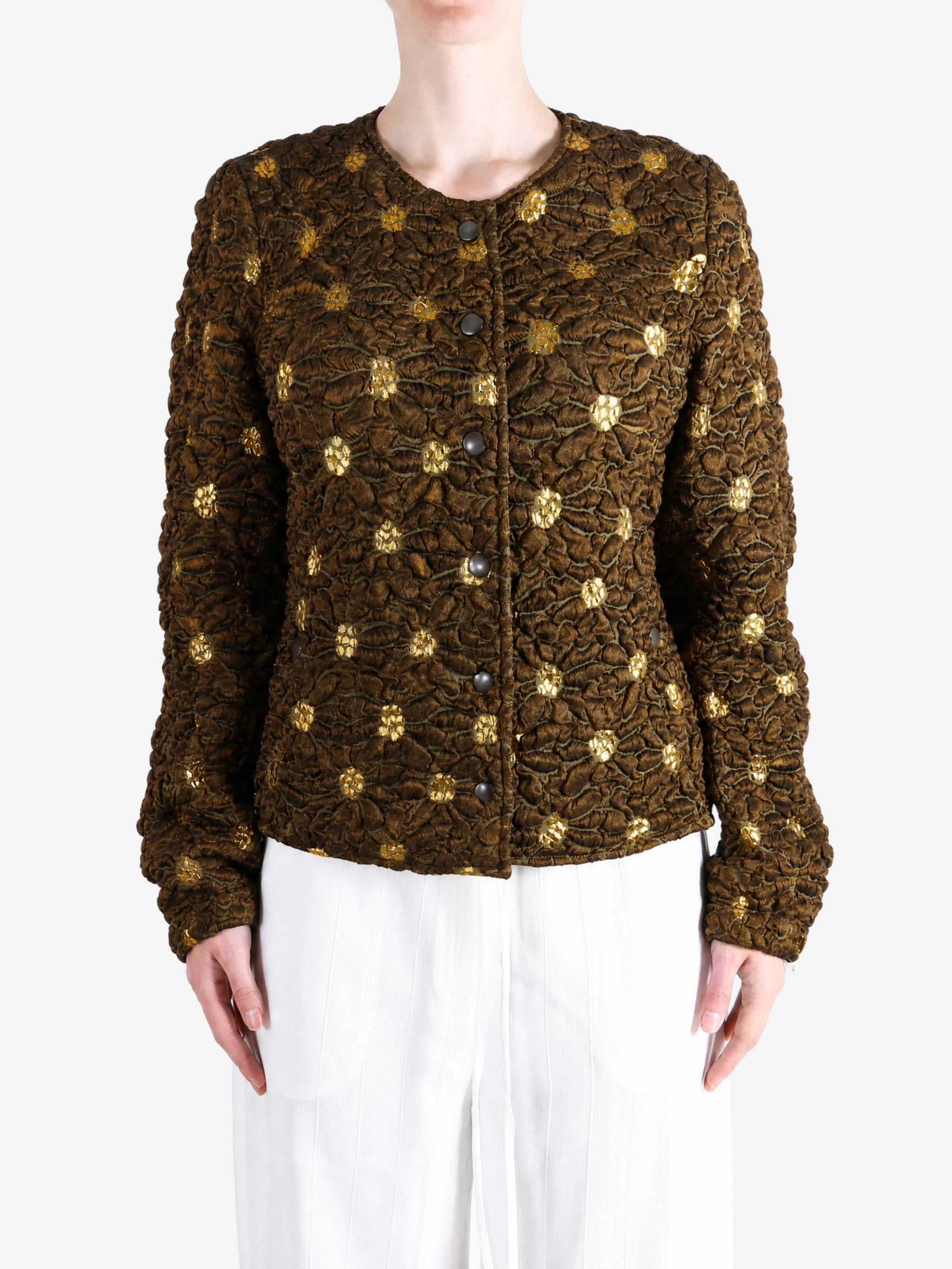 Brown jacket worn by a person, showing the jacket fit