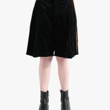 Black shorts worn by a person, showingt he short's fit