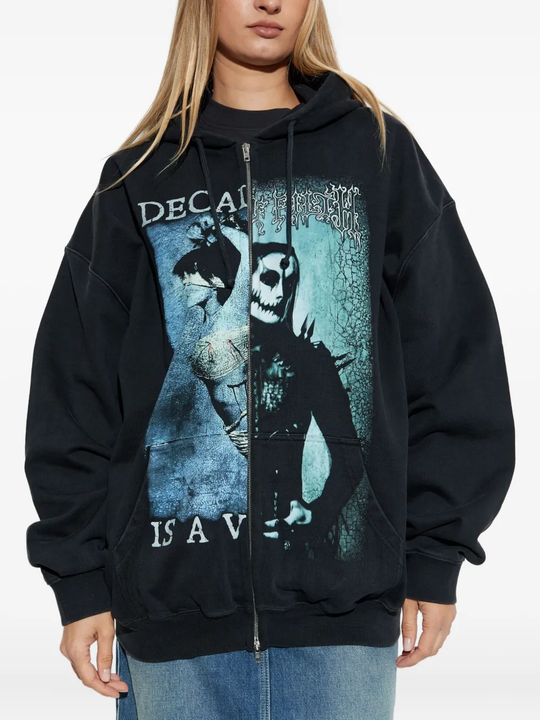 Black hoodie worn by a person, showing the hoodie fit