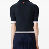 navy t-shirt worn by a person, showing the t-shirt fit