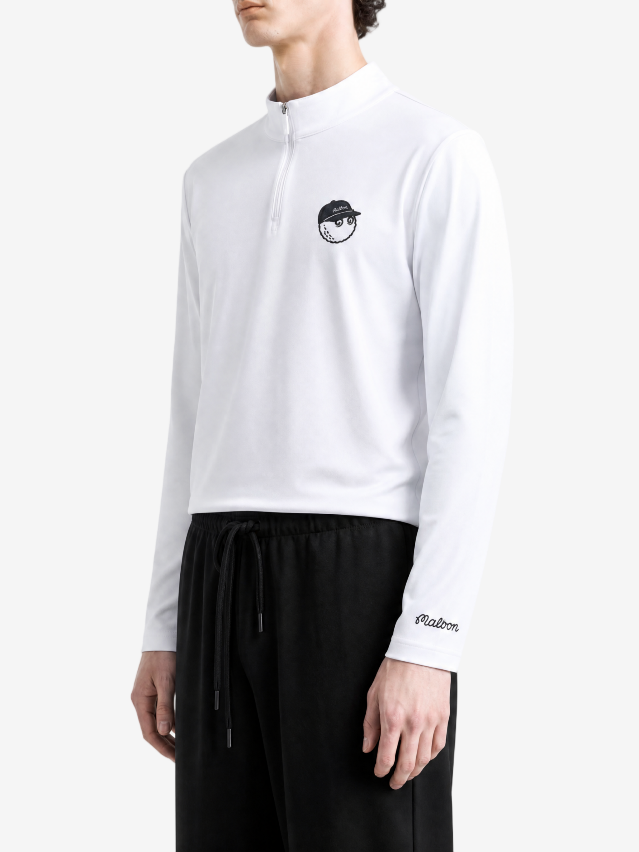 White hoodie worn by a person, showing the hoodie fit