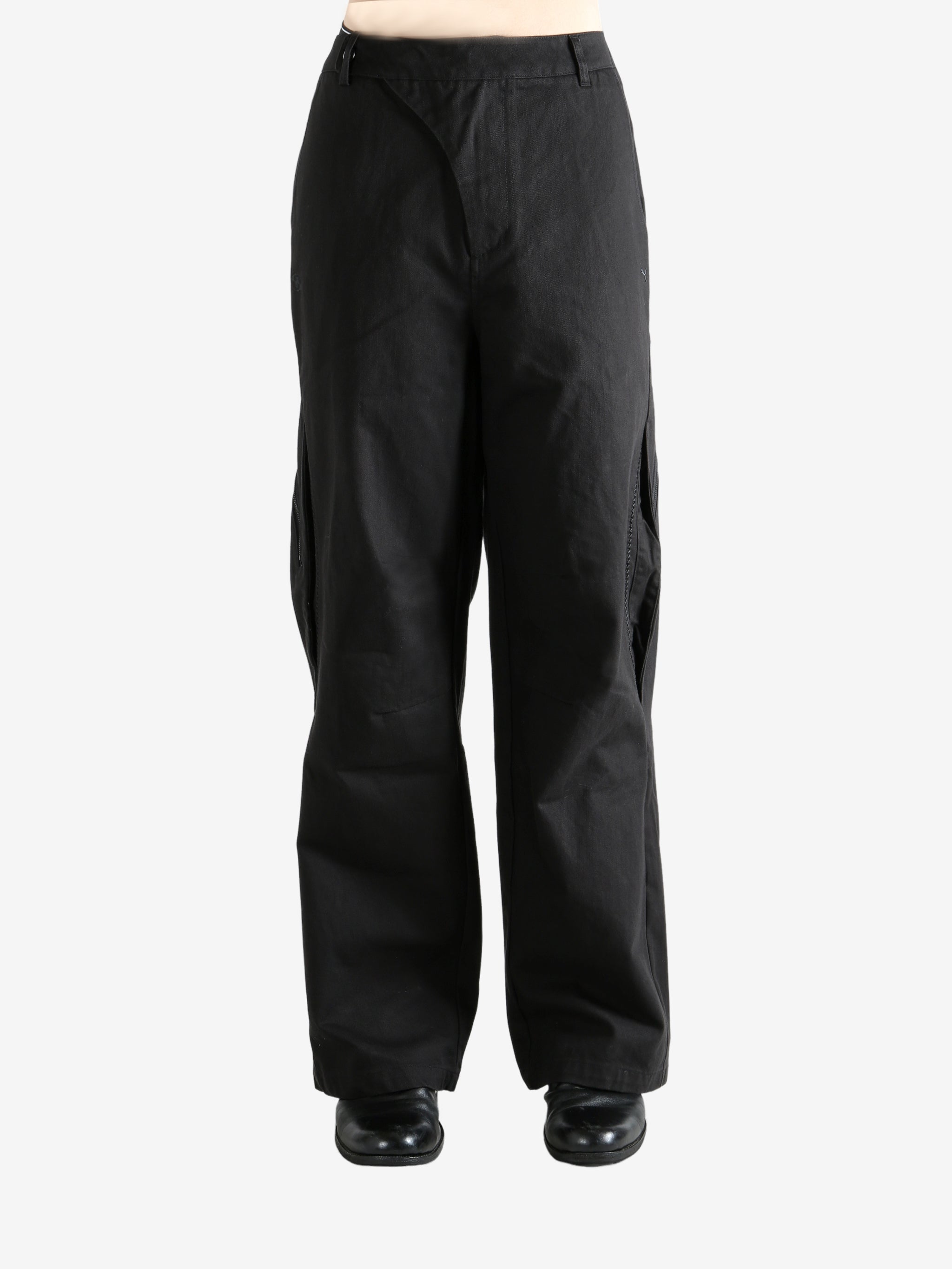 Black  pant worn by a person, showing the pant's fit