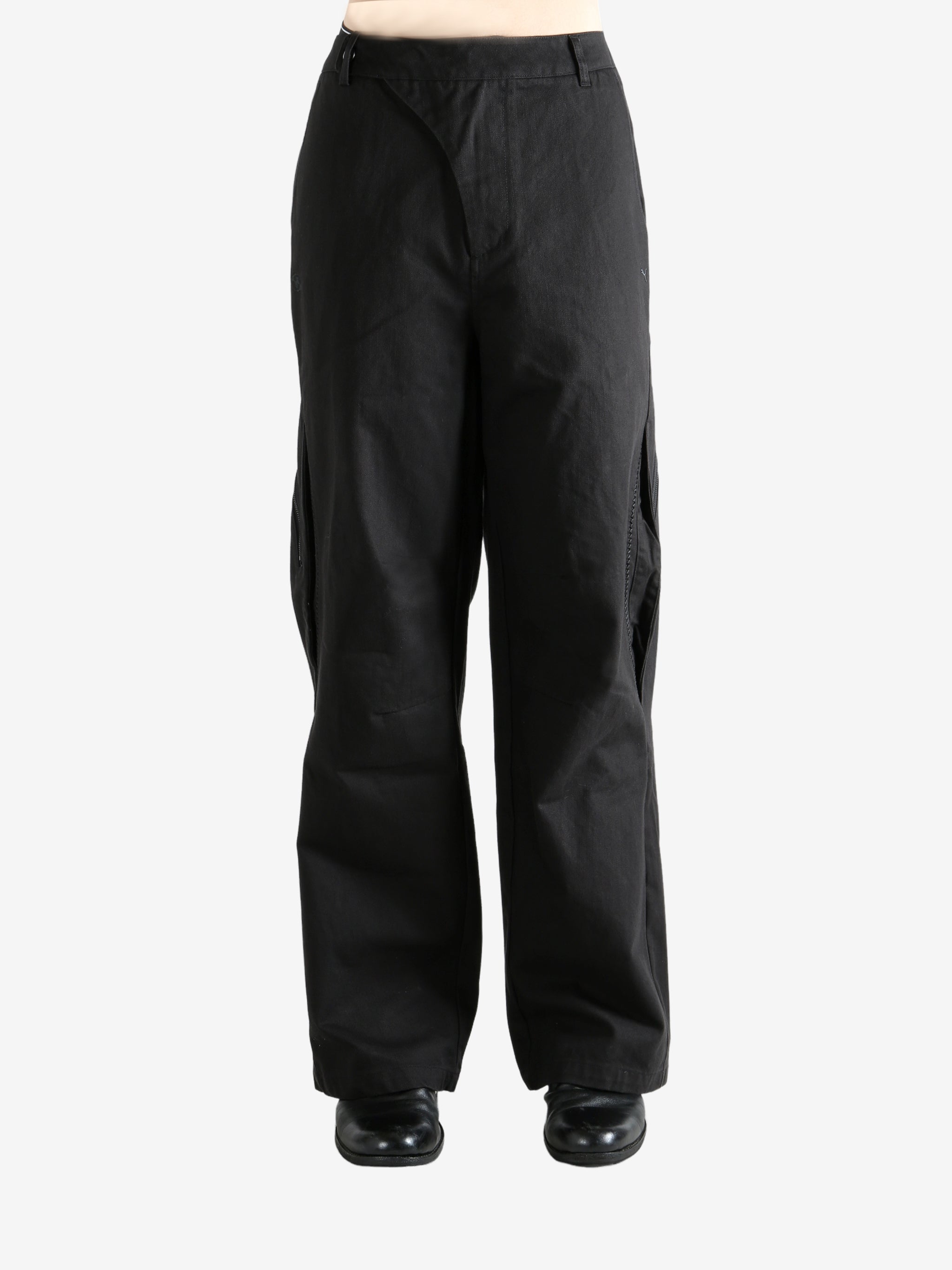 Black  pant worn by a person, showing the pant's fit