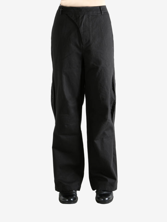 Black  pant worn by a person, showing the pant's fit