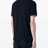 black shirts worn by a person, showing the shirts  fit