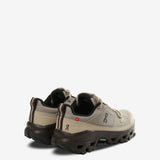 grey sneakers, side view