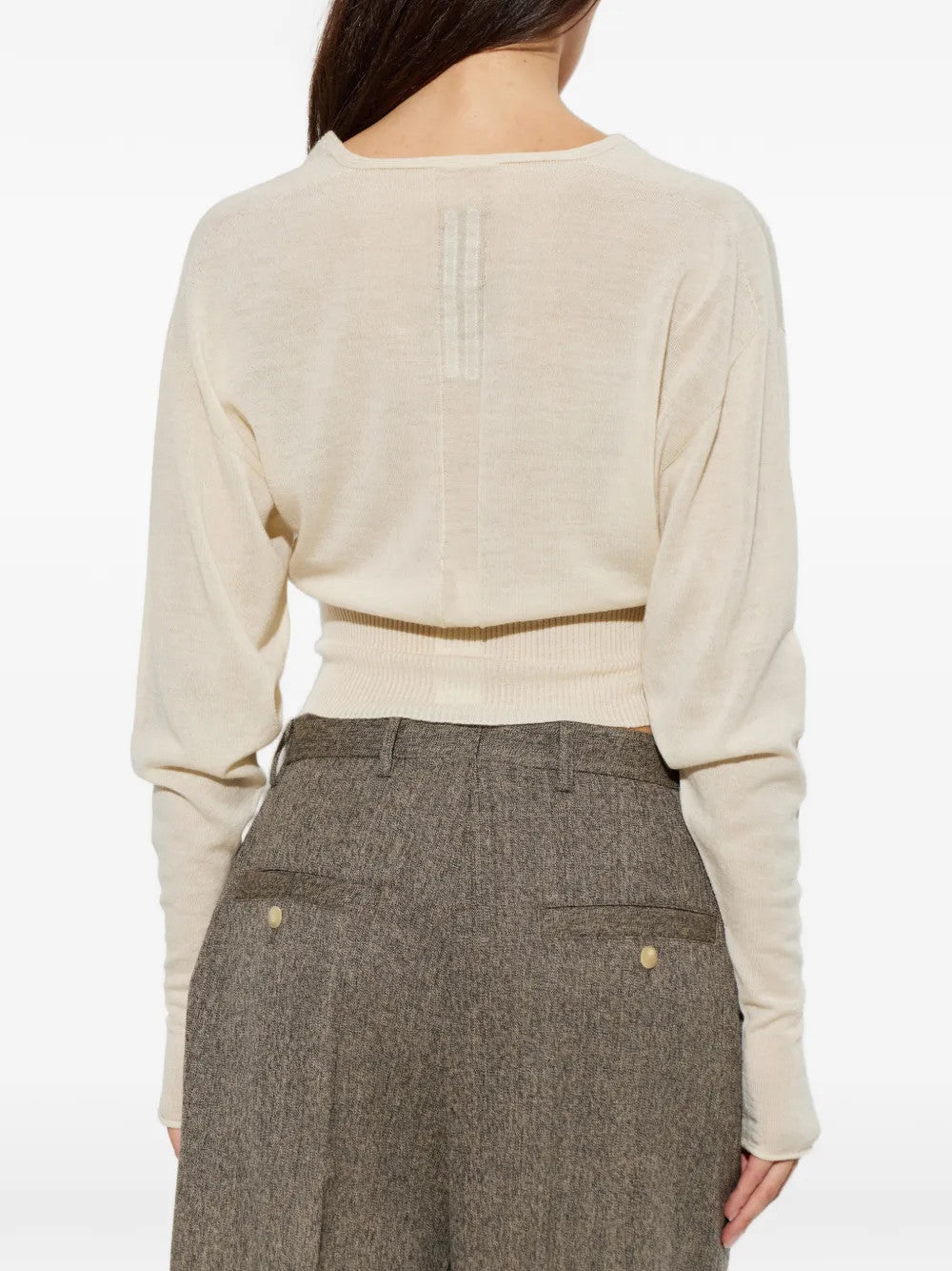 Tan top worn by a person, showing the top fit