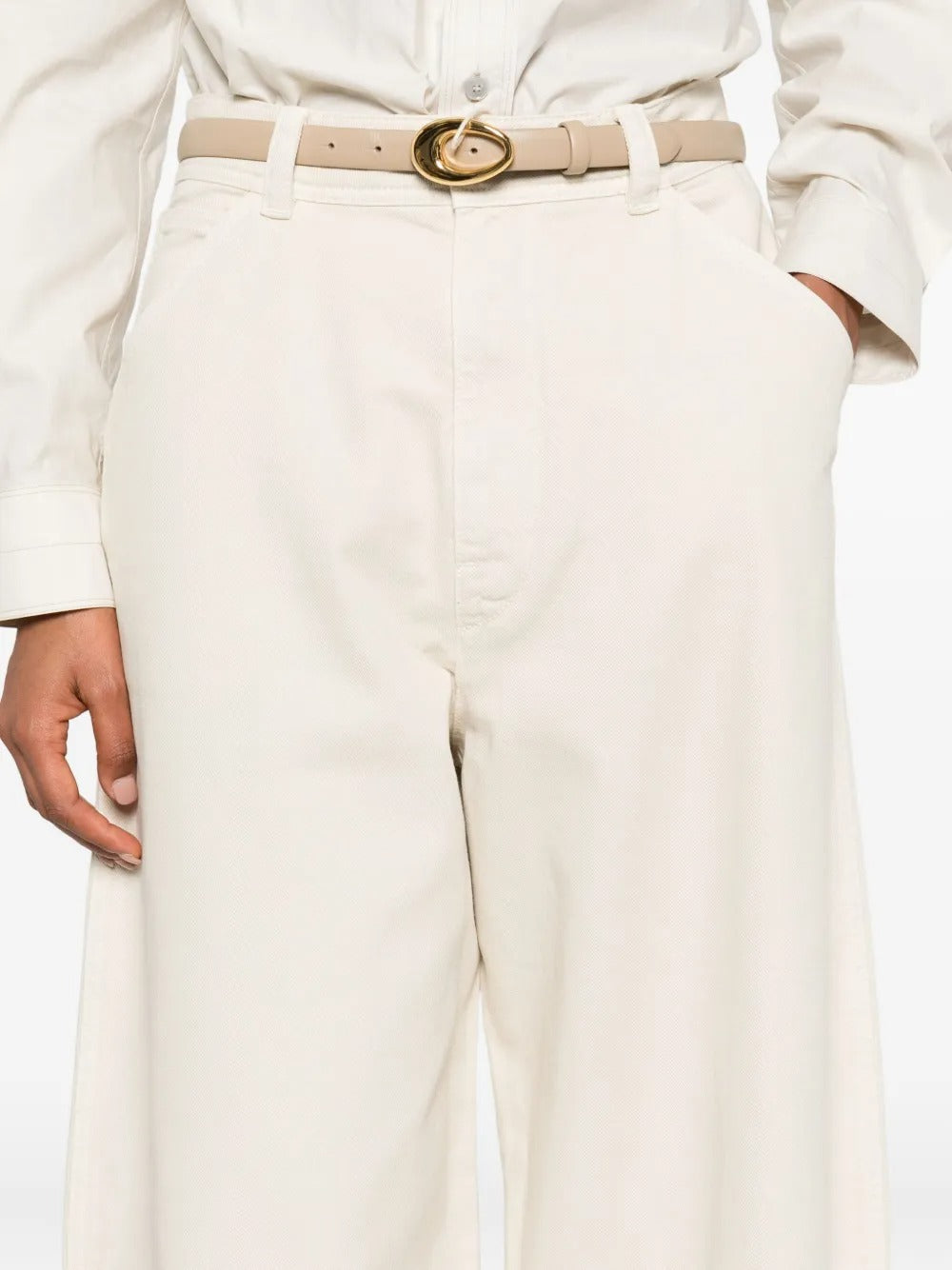 Close up of the white pants, showing texture of the cotton fabric