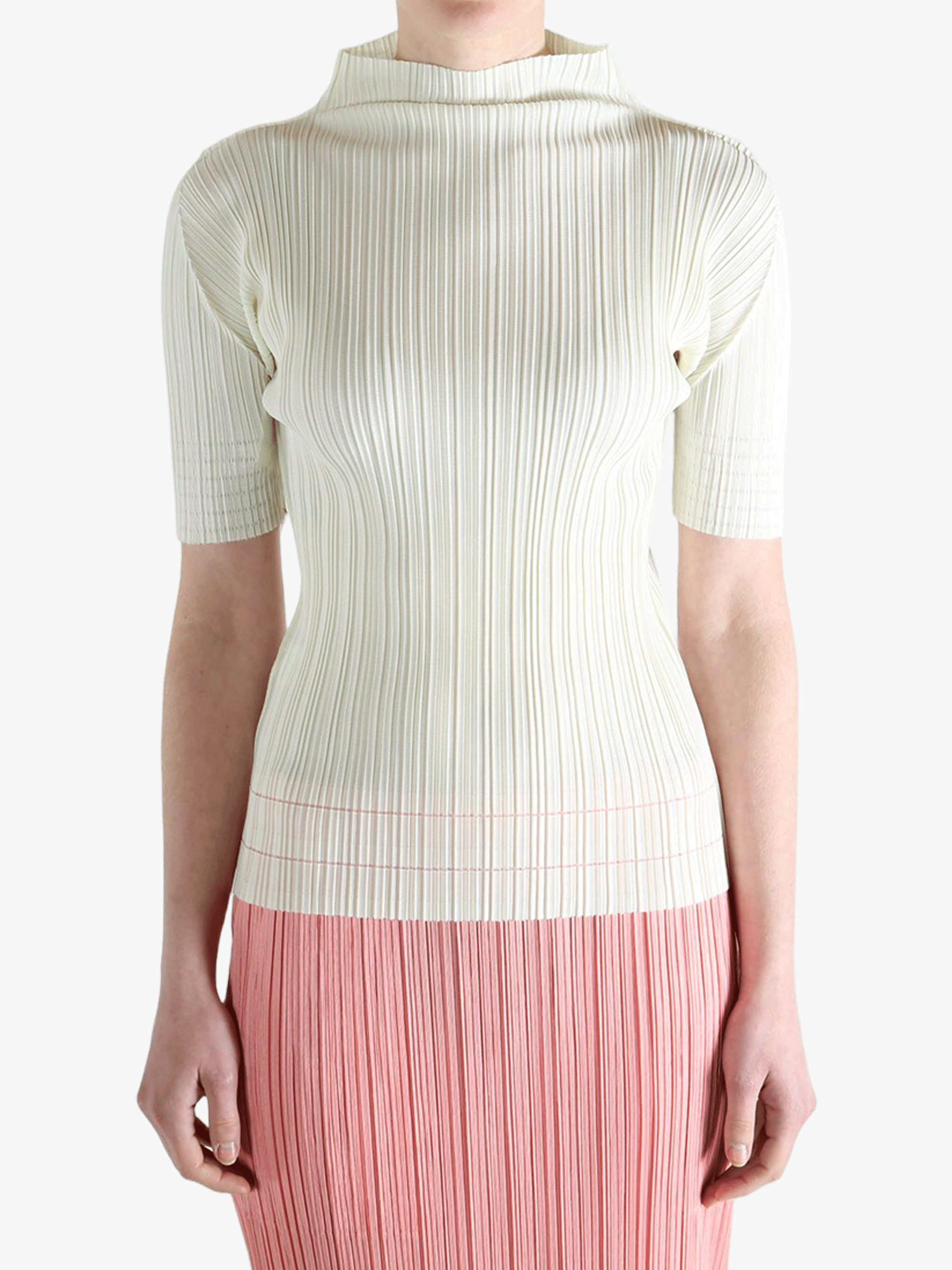 White shirt worn by a person, showing the shirt's fit