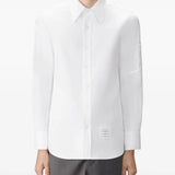 White shirt worn by a person, showing the shirt fit