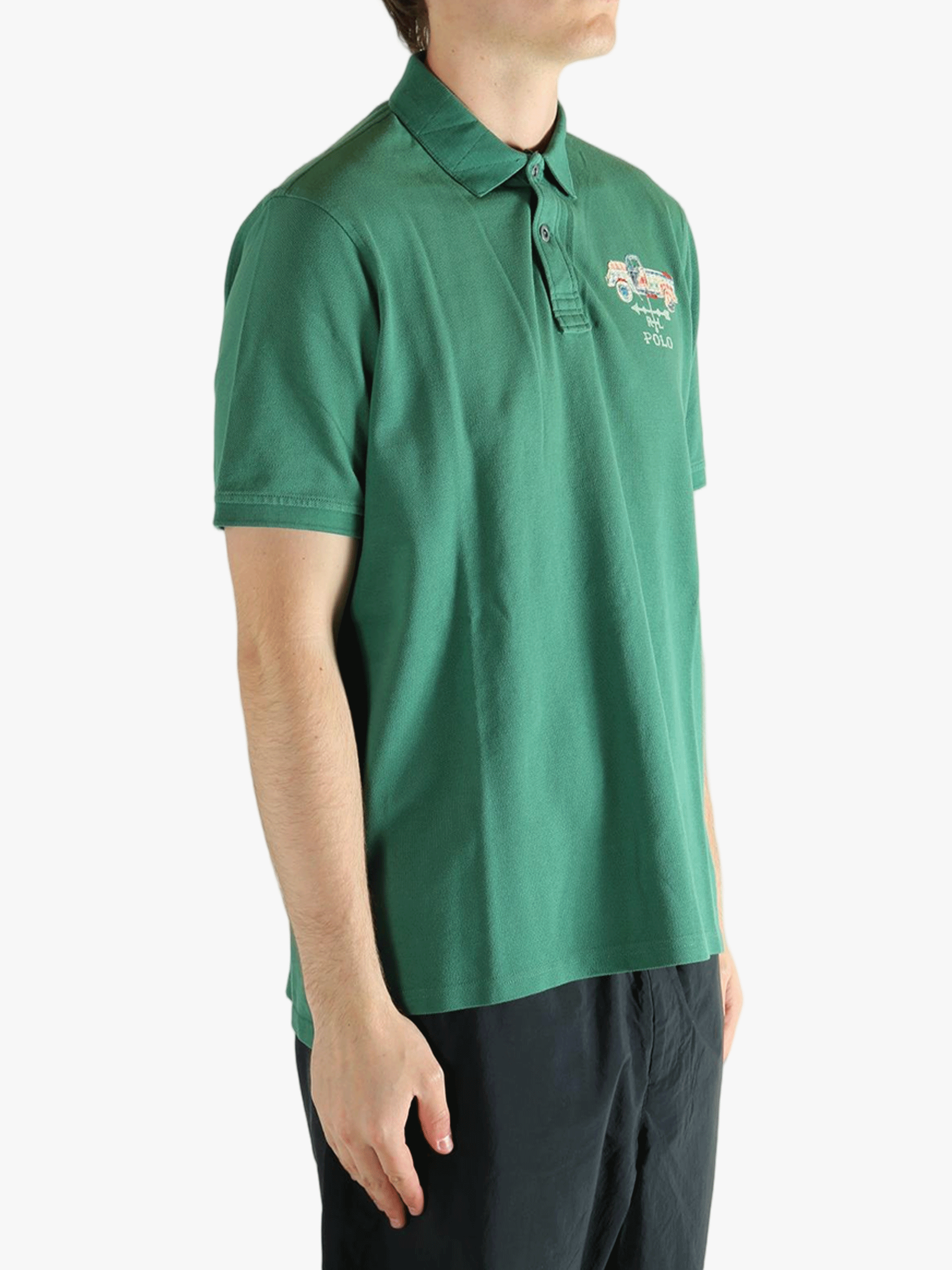 Green t-shirt  worn by a person, showing the t-shirt's fit