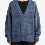 Blue hoodie worn by a person, showing the hoodie fit